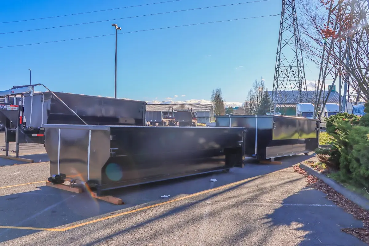 Roll-off dumpster ready for waste disposal at job site for 4 Yard Dumpster Rental in Charlton